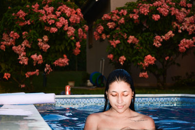 Smiling woman in swimming pool