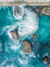 High angle view of swimming in sea