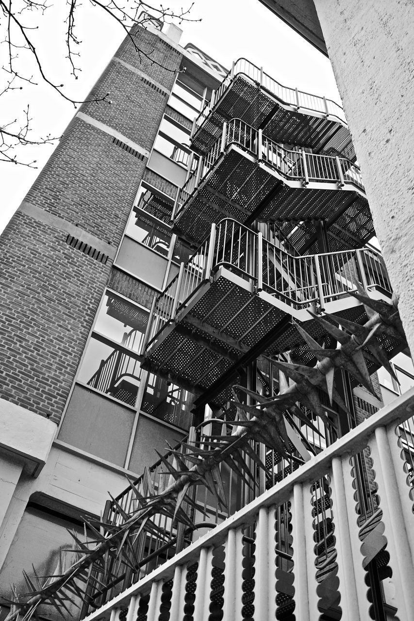 LOW ANGLE VIEW OF STAIRCASE ON BUILDING