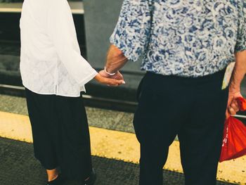 Midsection of woman standing