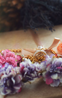 Close-up of pink roses on table