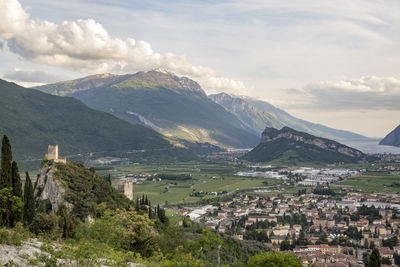 Scenic view of landscape and mountains against sky