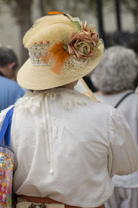 Rear view of woman wearing hat