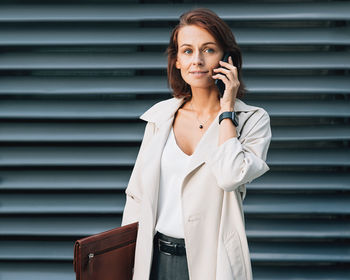 Young woman talking on mobile phone