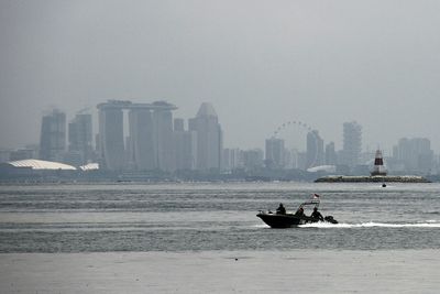 Boat sailing in sea