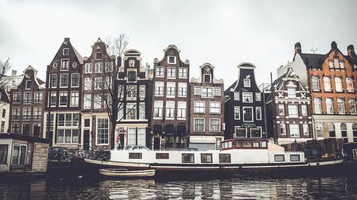 Buildings in city against sky