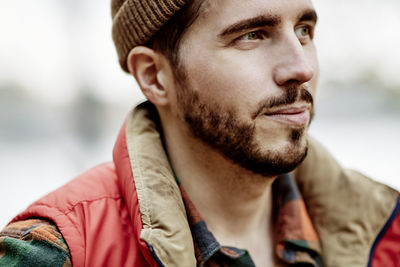 Portrait of young man looking away