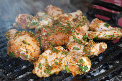 Close-up of meat on barbecue