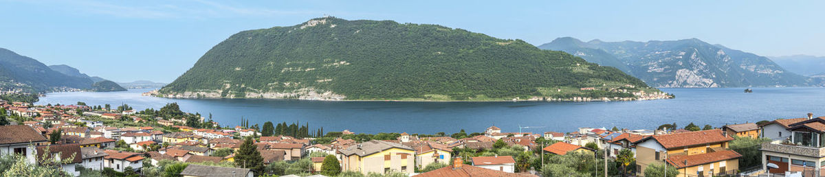 Extra wide view of monte isola in the lake iseo