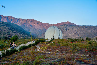 Scenic view of landscape against clear blue sky