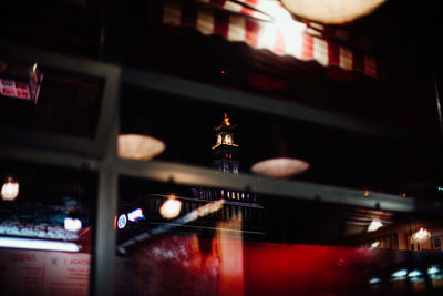 Close-up of illuminated buildings at night