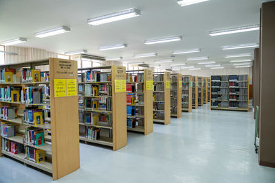 Interior of building library, a lot of books in shelf