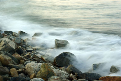 Turbulence sea water and rock at coastline