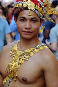 Portrait of shirtless young woman