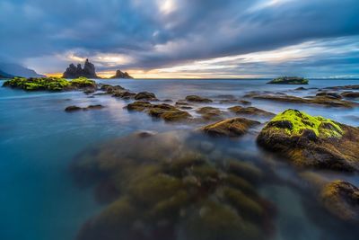 Scenic view of sea against sky during sunset