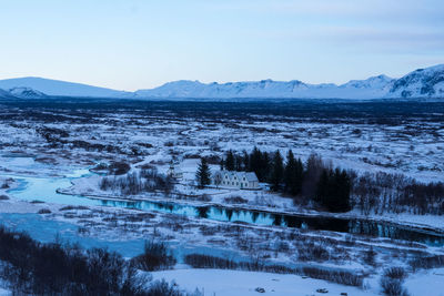 Scenic view of snowcapped mountains against sky
