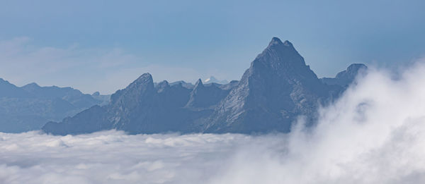 Scenic view of snowcapped mountains against sky