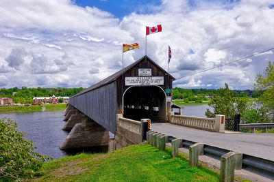 Bridge over river against sky