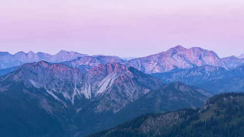 Scenic view of mountains against sky during sunset