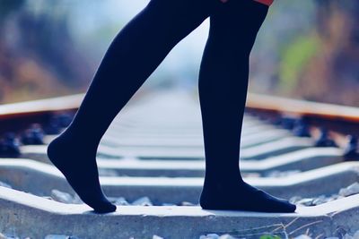 Low section of woman against blurred background