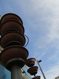 Low angle view of street light against sky