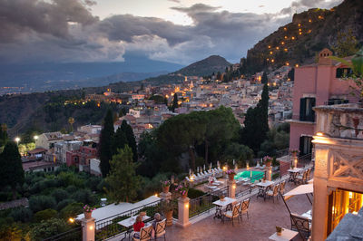 High angle view of illuminated buildings in town