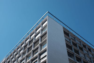 Low angle view of modern building against clear sky