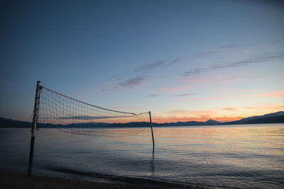 Scenic view of lake prespa in macedonia against sky during sunset