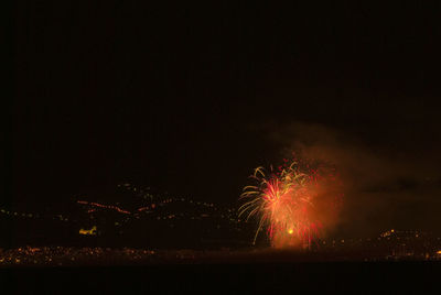 Firework display at night