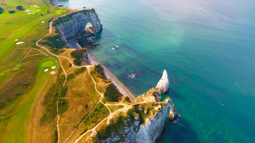 Aerial view of mountain by sea at etretat