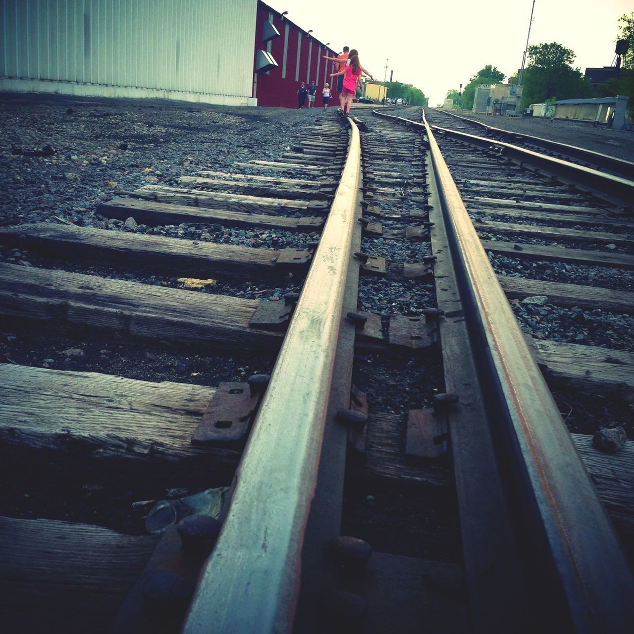 the way forward, transportation, diminishing perspective, railroad track, vanishing point, built structure, rail transportation, connection, long, railing, sky, clear sky, travel, mode of transport, bridge - man made structure, architecture, day, incidental people, outdoors, sunlight