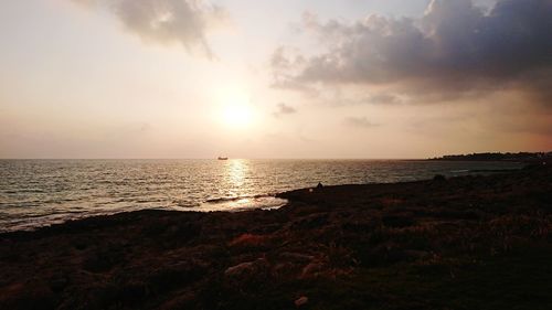 Scenic view of sea against sky during sunset