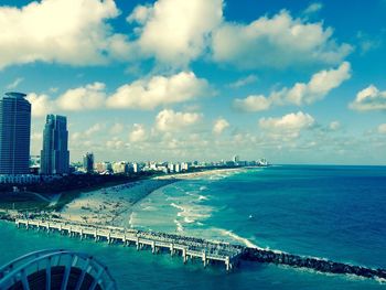 Scenic view of sea against cloudy sky