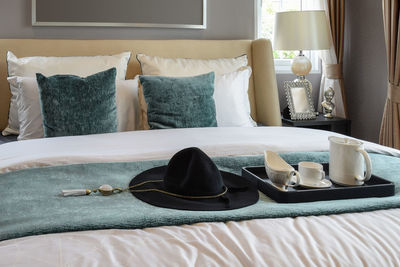 High angle view of eyeglasses on bed at home