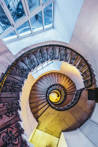 Directly below shot of spiral staircase in building