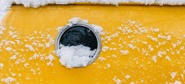 Close-up of snow covered metal