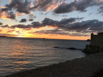 Scenic view of sea against sky during sunset