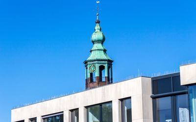 Low angle view of building against blue sky