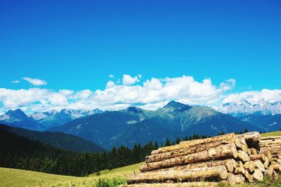 Scenic view of mountains against cloudy sky