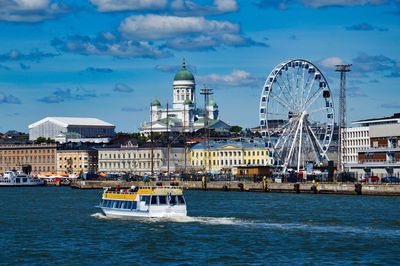 View of ferris wheel in city