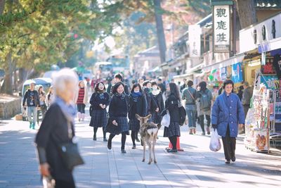 People walking on city street