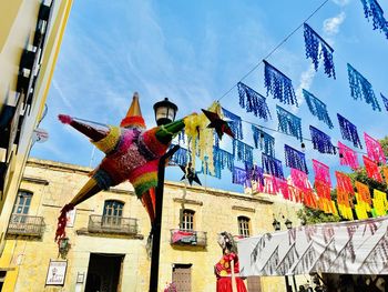 Low angle view of people on street