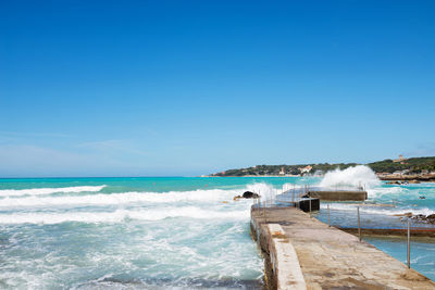 Beautiful azure sea and the rocky beach, tyrrhenian sea in tuscany, italy