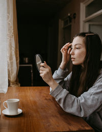 Young woman using mobile phone