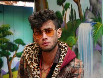 Portrait of young man wearing sunglasses