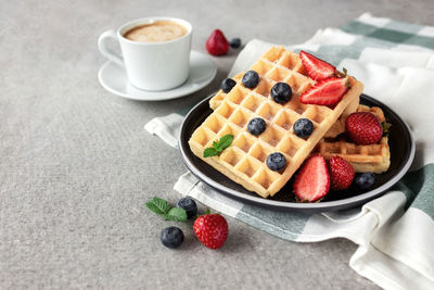 High angle view of breakfast served on table