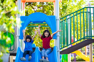 Full length of boy standing in playground