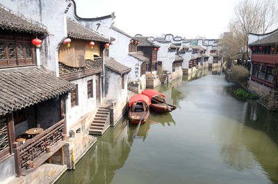 Canal amidst buildings in town