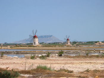 Built structure on field against clear sky