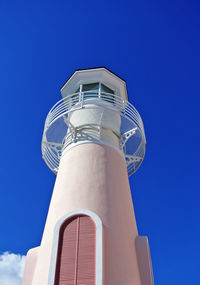 Low angle view of building against blue sky